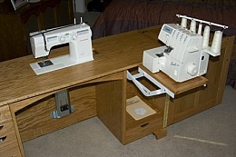 Homemade sewing machine cabinet constructed from red oak and oak