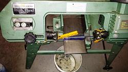 Click image for larger version.&nbsp;

Name:	Using horizontal bandsaw to cut CRS plate for clamp.jpg&nbsp;
Views:	1576&nbsp;
Size:	86.6 KB&nbsp;
ID:	4238