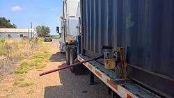 Crane lifts shipping container stuck to trailer - GIF-wp_20200622_12_37_59_pro122.jpg