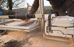 Cutting oversized logs and DIY chainsaw mill-sawdust.jpg