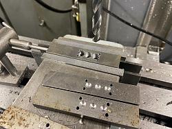 cutting solid rivets to correct length to form button heads-chain-drilling.jpg