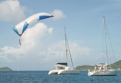 Enormous waving flag picks up man and drops him - GIF-spinnaker_flying.jpg
