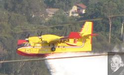 Fire bomber dumping retardant close to hillside - GIF-fire-9-03-09-14.jpg