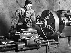 High-quality black-and-white photographs of large old machines and tools-lathe.jpg