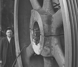 High-quality black-and-white photographs of large old machines and tools-massive-hub.png