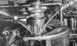 High-quality black-and-white photographs of large old machines and tools-so-much-going-here.png