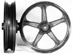 High-quality black-and-white photographs of large old machines and tools-tfwheel.gif