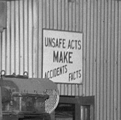 High-quality black-and-white photographs of large old machines and tools-unsafe-acts.png