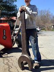 High-quality black-and-white photographs of large old machines and tools-wrench.jpg