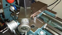 Click image for larger version.&nbsp;

Name:	Cross slide locking clamp to 12 inch swing geared-head lathe.jpg&nbsp;
Views:	1076&nbsp;
Size:	89.4 KB&nbsp;
ID:	5957