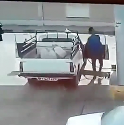 Massive flying debris crashes through gas station roof - GIF-frame-2.png