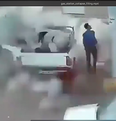 Massive flying debris crashes through gas station roof - GIF-frame-3.png