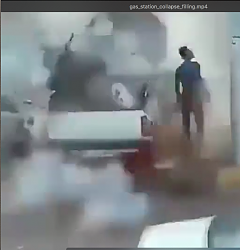 Massive flying debris crashes through gas station roof - GIF-frame-4.png