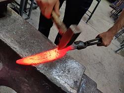 Pattern Welded ("Damascus") Chef's Knife-hitting_it.jpg