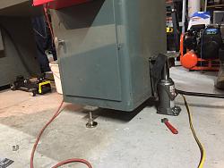 TOE JACK DOWN AND DIRTY BUT IT WORKS LIKE A CHARM FOR LIFTING A LATHE!!-image.jpg