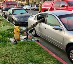 Truck forces way through parked cars - GIF-just-desserts.jpg