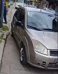 Truck forces way through parked cars - GIF-parking-101.png