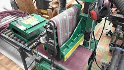Why flat belts need crowned pulleys.-view-machine.jpg