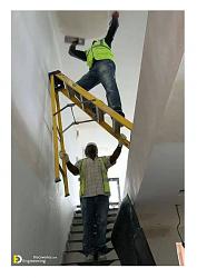 Worker loses balance on ladder - GIF-painters.jpg