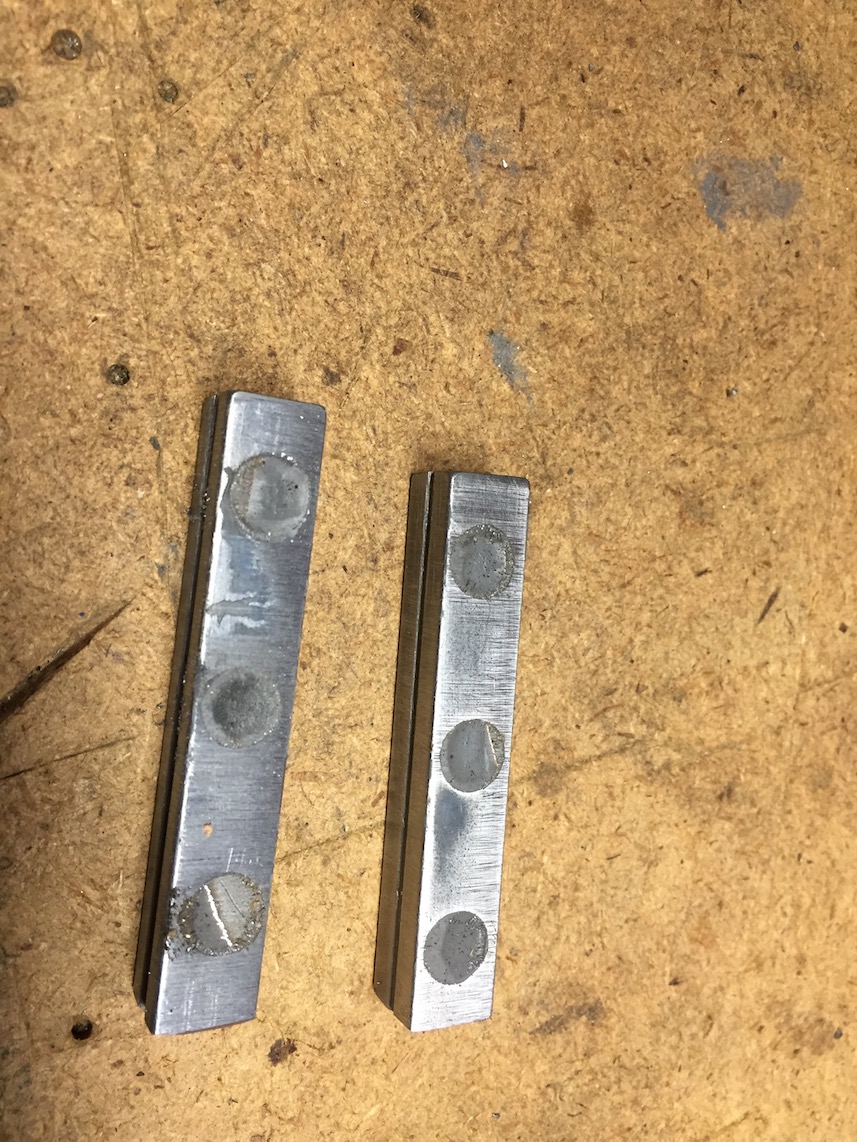 Magnets, epoxied into shallow holes