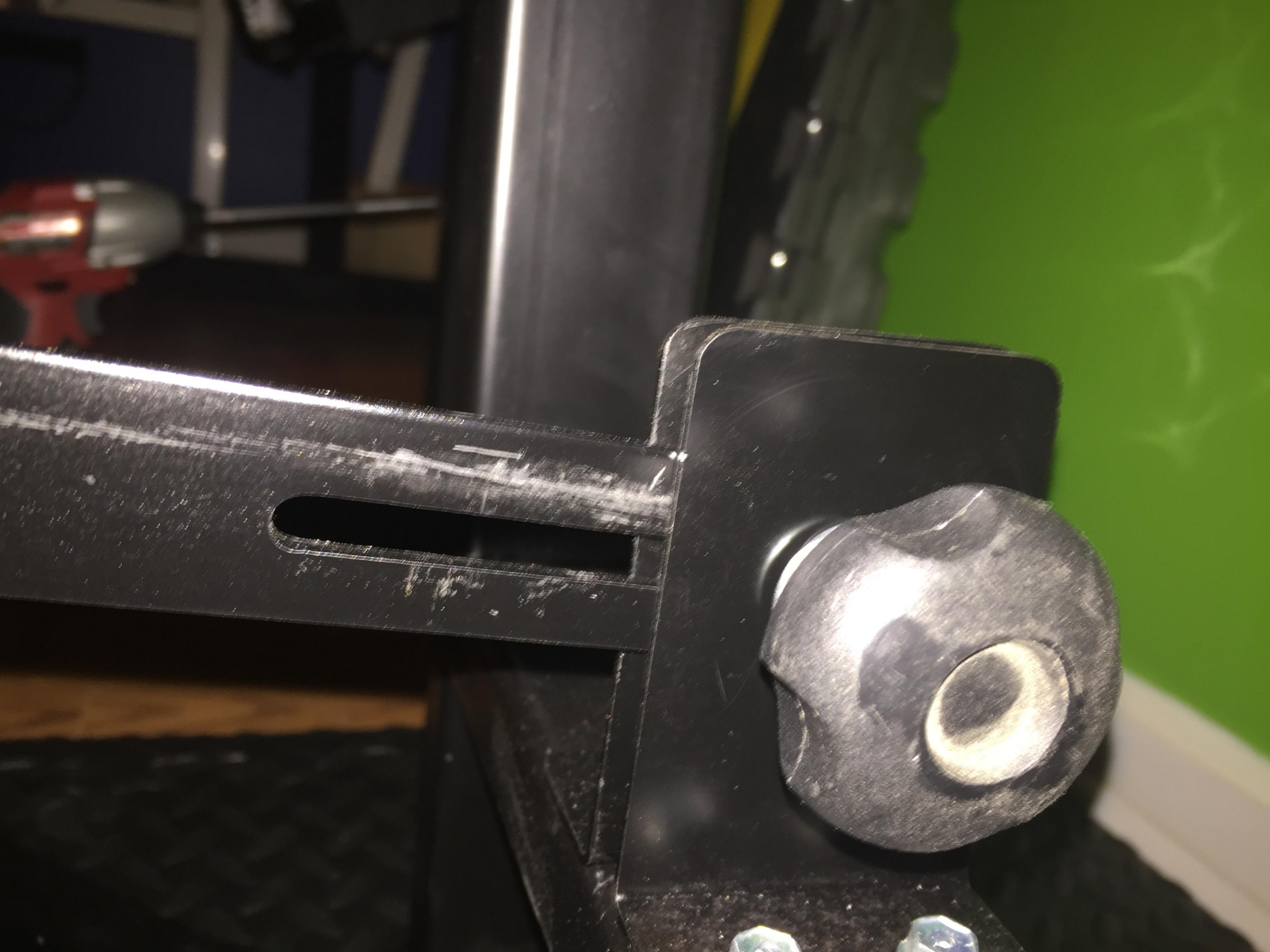 After the height is adjusted this knob locks the pivot in place. The slot was done on the drill press with a debarring bit.