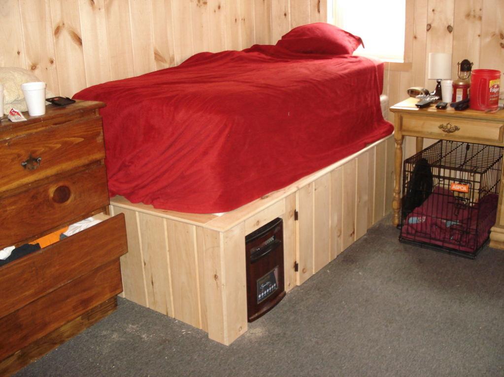 Loft cabin bed frame

if you like to see how it was build 

http://www.instructables.com/id/Raised-cabin-bed-frame-with-hidden-space/