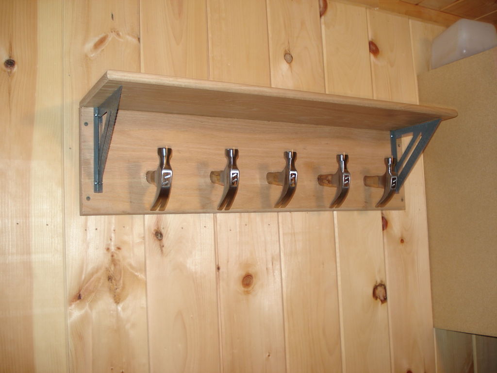 carpenter themed  coat rack

http://www.instructables.com/id/Carpenter-themed-fathers-day-coat-rack/