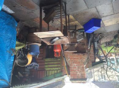 Cannot account for inverted image. Shows chimney at rear & fair weather set-up. Workshop is 4 x 3 yards, not including hearth