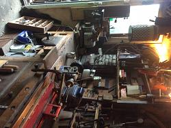 members/philip-davies/albums/philip-s-backyard-forge/6594-my-workbench-note-fine-dust-extractor-linisher-door-jamb-little-wood-turning-lathe-router-cabinet-lid-floor-door.jpg